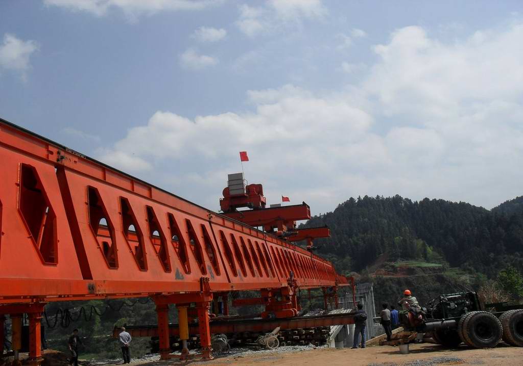 Highway bridge girder launcher